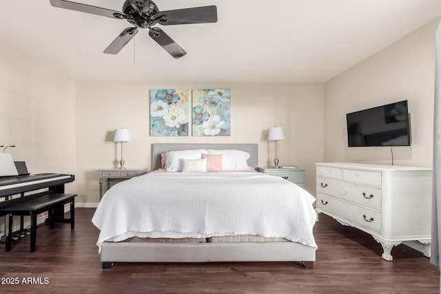 bedroom featuring dark wood-style floors, ceiling fan, and baseboards