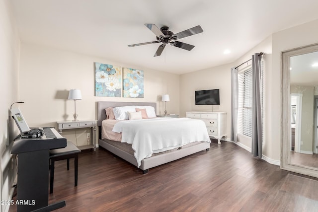 bedroom featuring dark wood-type flooring and ceiling fan