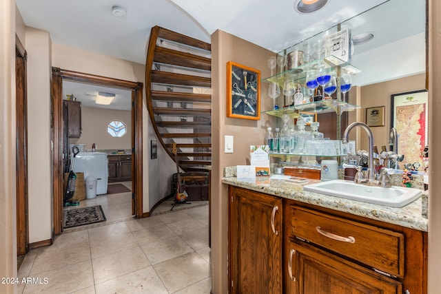 bathroom with tile patterned floors and sink