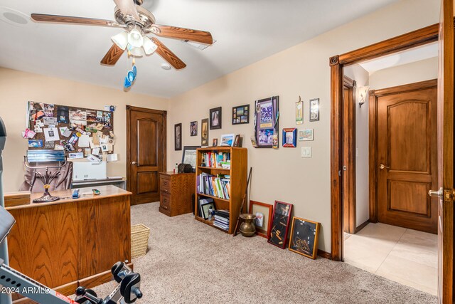 office area with light carpet and ceiling fan