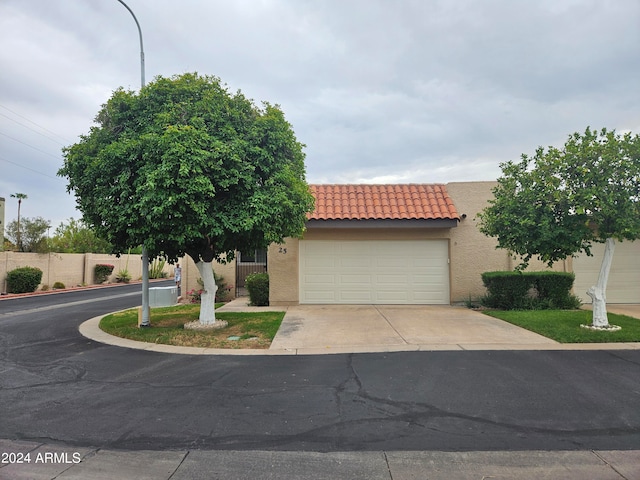 view of front of property featuring a garage