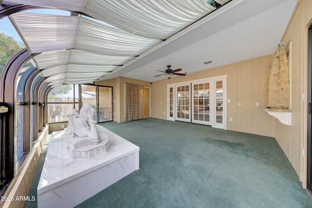 unfurnished sunroom with visible vents and french doors