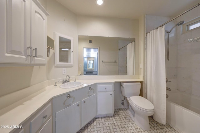 bathroom featuring toilet, vanity, shower / bath combo, and visible vents