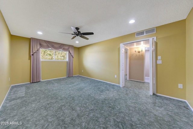 empty room featuring recessed lighting, a textured ceiling, ceiling fan, and visible vents