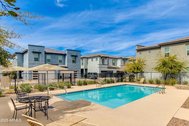 3045 N 37th Way, Phoenix, AZ 85018 - community pool featuring fence, a patio area, and a residential view