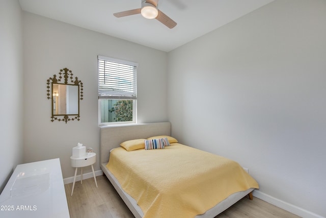 3045 N 37th Way, Phoenix, AZ 85018 - bedroom with light wood-type flooring, baseboards, and ceiling fan