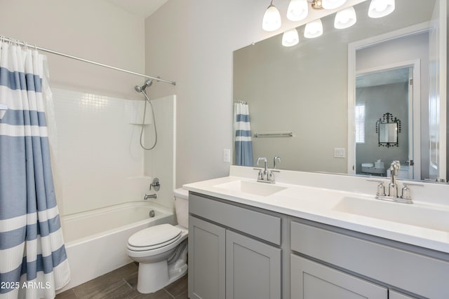 3045 N 37th Way, Phoenix, AZ 85018 - bathroom featuring toilet, shower / tub combo with curtain, a sink, and double vanity