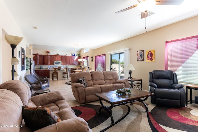 living room featuring ceiling fan