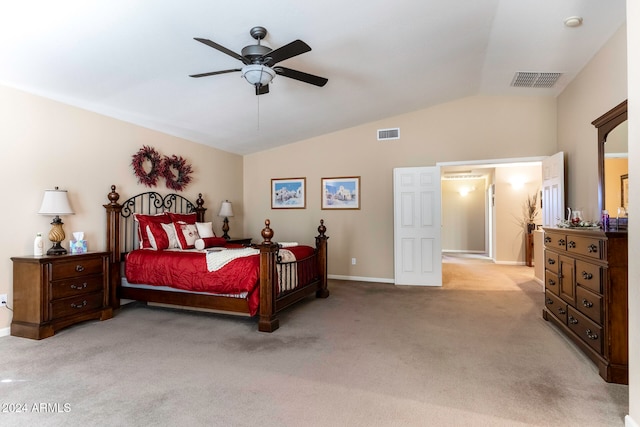 carpeted bedroom with ceiling fan and lofted ceiling