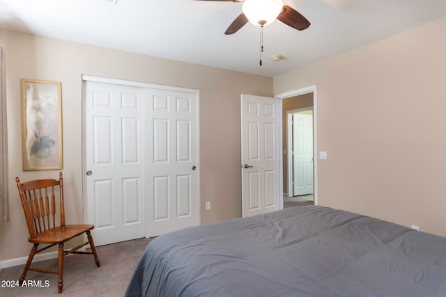 bedroom featuring carpet flooring, ceiling fan, and a closet