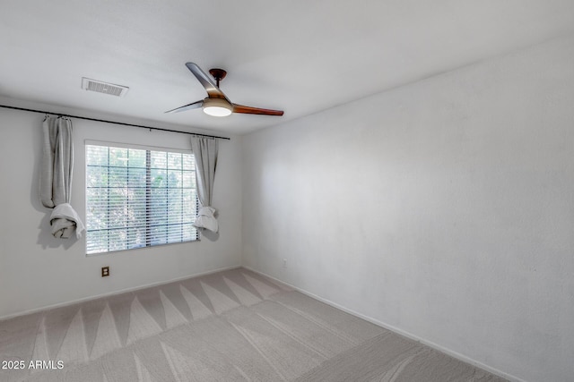 4443 W Escuda Dr, Glendale, AZ 85308 - unfurnished room featuring a ceiling fan, light carpet, and baseboards