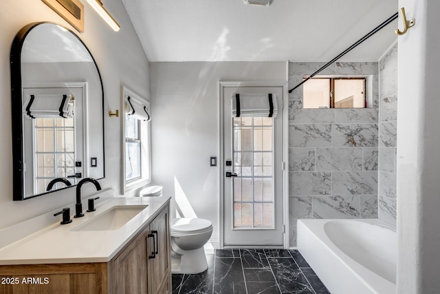 4443 W Escuda Dr, Glendale, AZ 85308 - full bath with toilet, vanity, marble look tiles, shower / bathtub combination, and vaulted ceiling
