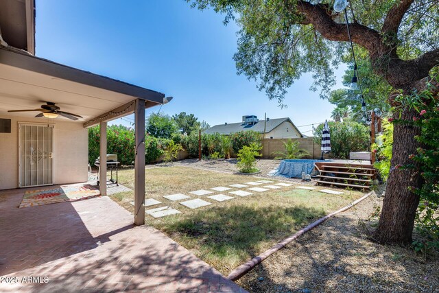 4443 W Escuda Dr, Glendale, AZ 85308 - view of yard featuring a ceiling fan and a patio area