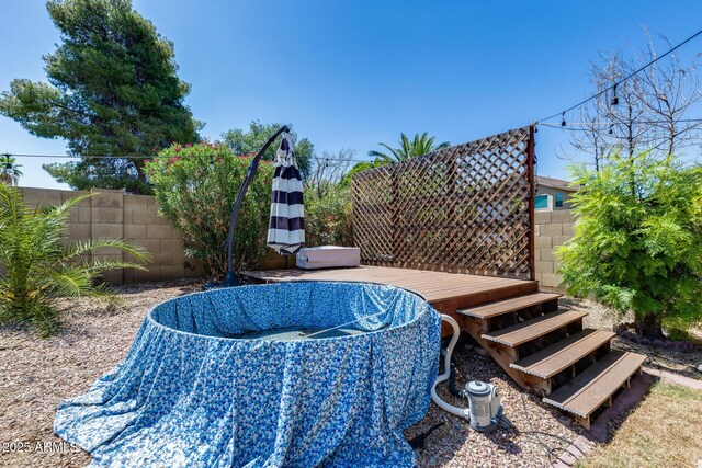 4443 W Escuda Dr, Glendale, AZ 85308 - view of swimming pool with a wooden deck