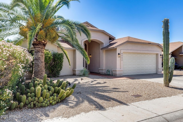 4443 W Escuda Dr, Glendale, AZ 85308 - view of front of home with a garage, stucco siding, and concrete driveway