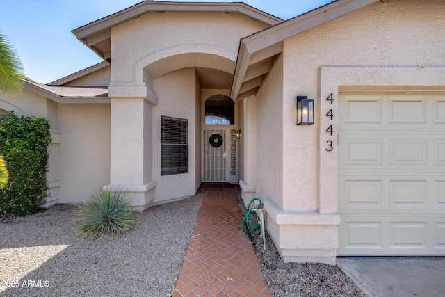 4443 W Escuda Dr, Glendale, AZ 85308 - property entrance with stucco siding and a garage