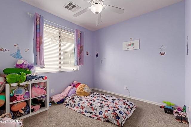 carpeted bedroom featuring ceiling fan