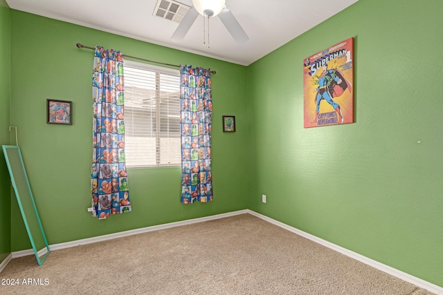 unfurnished room featuring carpet and ceiling fan