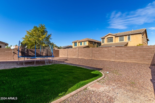 view of yard featuring a trampoline