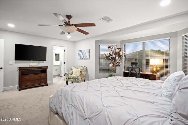 10617 W Daley Ln, Peoria, AZ 85383 - carpeted bedroom featuring recessed lighting, baseboards, ensuite bath, and ceiling fan