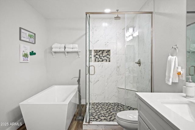 10617 W Daley Ln, Peoria, AZ 85383 - full bathroom featuring a marble finish shower, a freestanding bath, vanity, and toilet