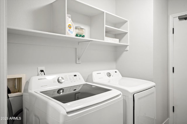 10617 W Daley Ln, Peoria, AZ 85383 - clothes washing area featuring washing machine and dryer