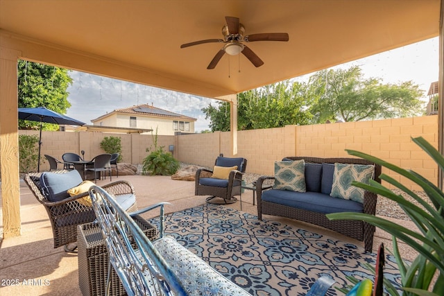 10617 W Daley Ln, Peoria, AZ 85383 - view of patio / terrace featuring an outdoor living space, ceiling fan, and a fenced backyard