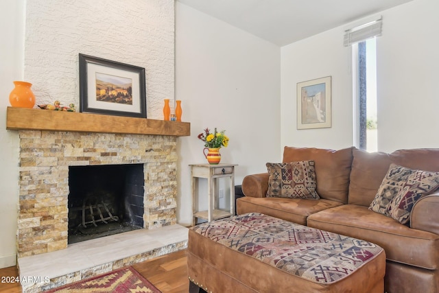 living room featuring a fireplace and hardwood / wood-style floors