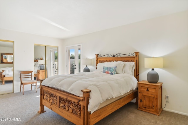 bedroom with carpet floors and french doors