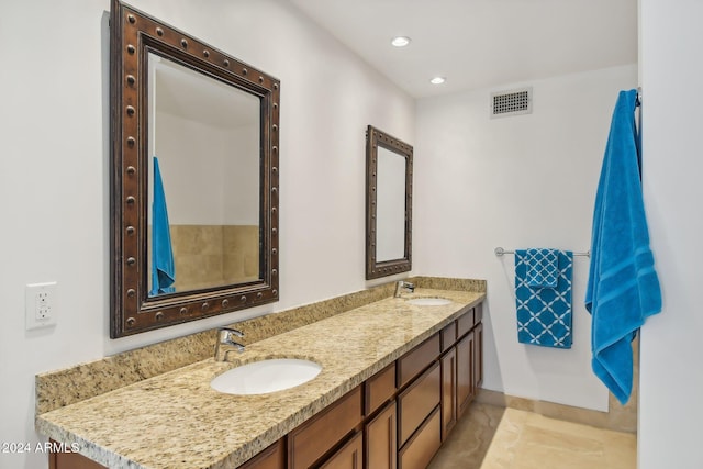 bathroom with vanity and tile patterned floors