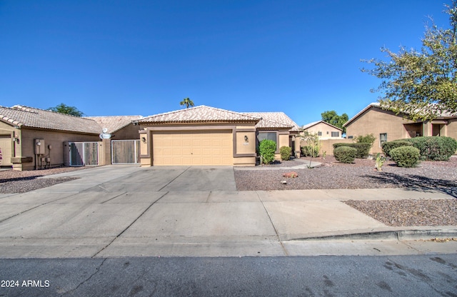 view of front of home with a garage