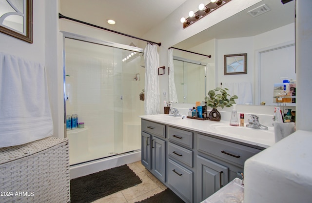 bathroom featuring vanity, a shower with shower curtain, and tile patterned floors