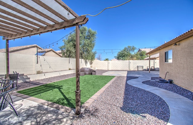 view of yard featuring a patio and a pergola