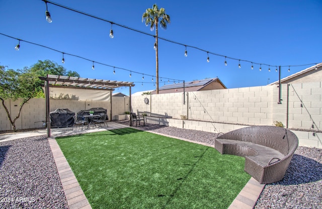 view of yard with a patio and a pergola