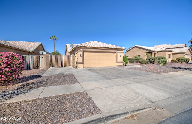 single story home featuring a garage