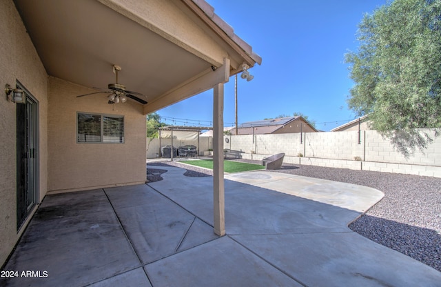 view of patio / terrace featuring ceiling fan