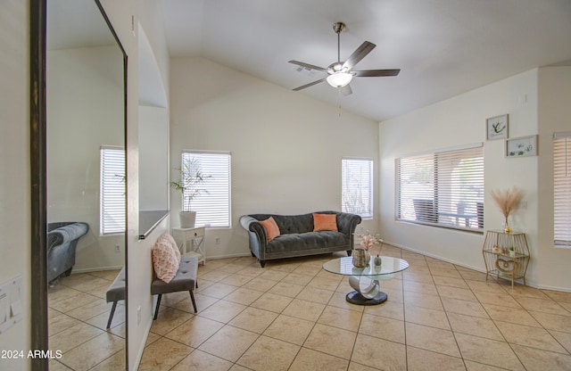 tiled living room featuring lofted ceiling and ceiling fan