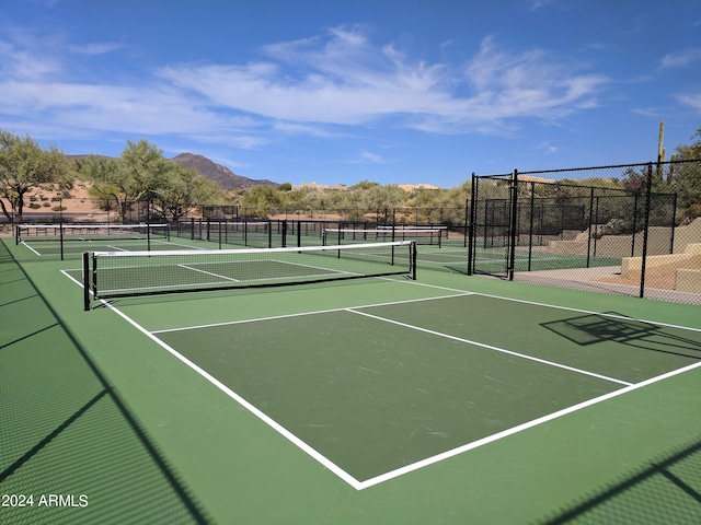 view of sport court with a mountain view