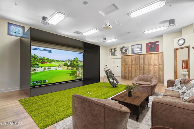 10935 E Grandview Way, Scottsdale, AZ 85255 - playroom with baseboards, golf simulator, and wood finished floors