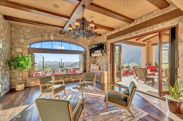 10935 E Grandview Way, Scottsdale, AZ 85255 - living area featuring beam ceiling, hardwood / wood-style flooring, and a healthy amount of sunlight