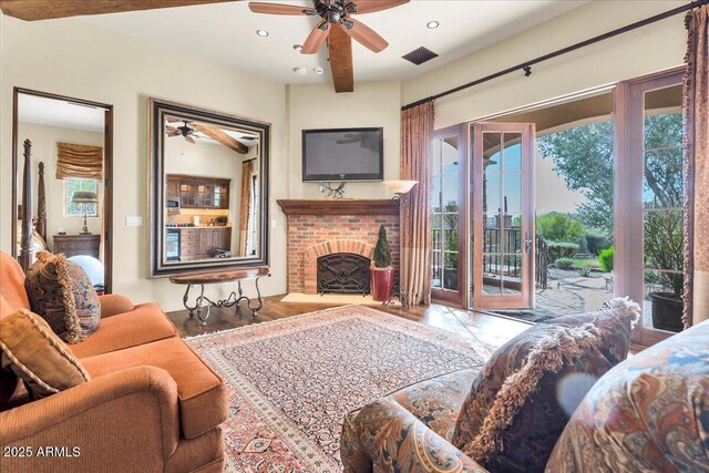 10935 E Grandview Way, Scottsdale, AZ 85255 - living room featuring visible vents, a fireplace, a wealth of natural light, and recessed lighting
