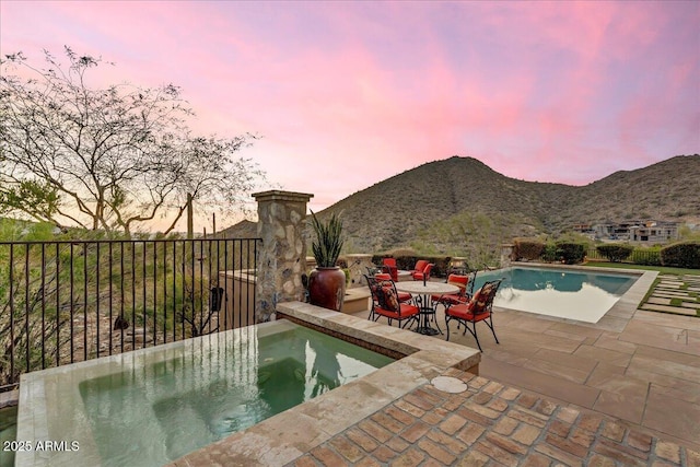10935 E Grandview Way, Scottsdale, AZ 85255 - view of pool with a mountain view, an in ground hot tub, fence, a fenced in pool, and a patio area