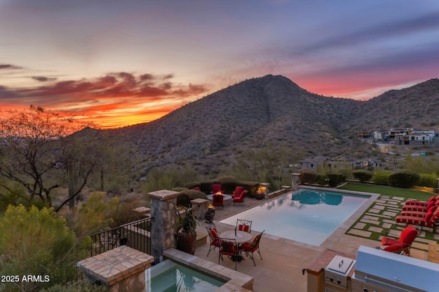 10935 E Grandview Way, Scottsdale, AZ 85255 - outdoor pool with a patio, outdoor dining space, and a mountain view