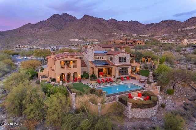 10935 E Grandview Way, Scottsdale, AZ 85255 - exterior space with outdoor dining space, a patio area, a mountain view, and an outdoor hangout area
