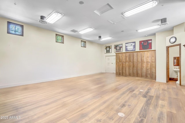10935 E Grandview Way, Scottsdale, AZ 85255 - spare room with light wood-style floors, visible vents, and baseboards