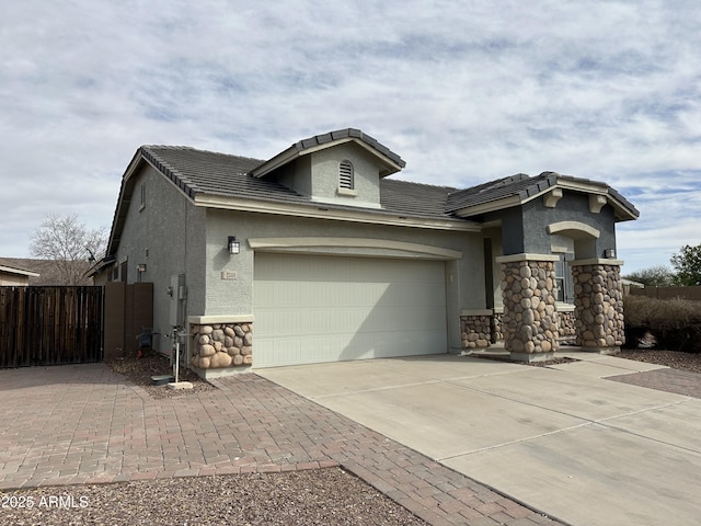 view of front of home with a garage