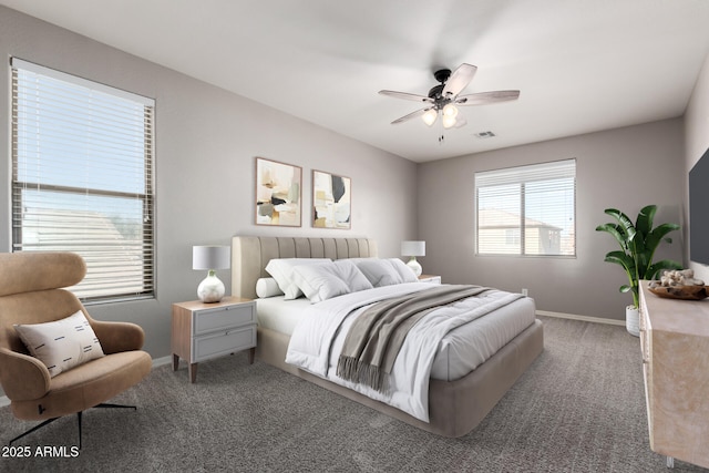 bedroom featuring ceiling fan and carpet