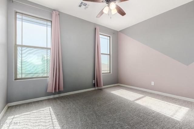 bonus room with vaulted ceiling, ceiling fan, and carpet flooring