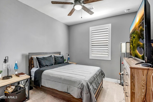 19736 W Turney Ave, Litchfield Park, AZ 85340 - bedroom with light carpet, baseboards, and ceiling fan