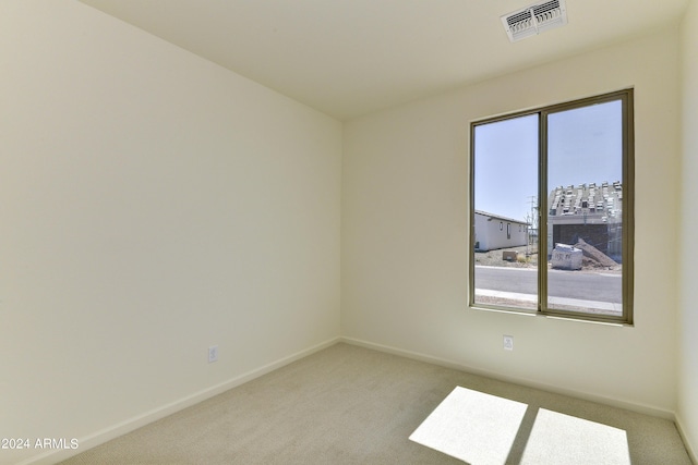 4320 Sawbuck Way, Wickenburg, AZ 85390 - empty room with baseboards, carpet floors, visible vents, and plenty of natural light